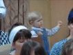 Little girl dramatically manages choir