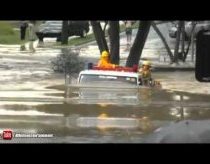 Fire truck drives through 11ft flood