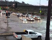 Lamborghini fording the flood San Diego River