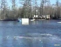 Truck Attempts To Cross Flooded Road
