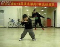 Young boy showing off his hip hop skills